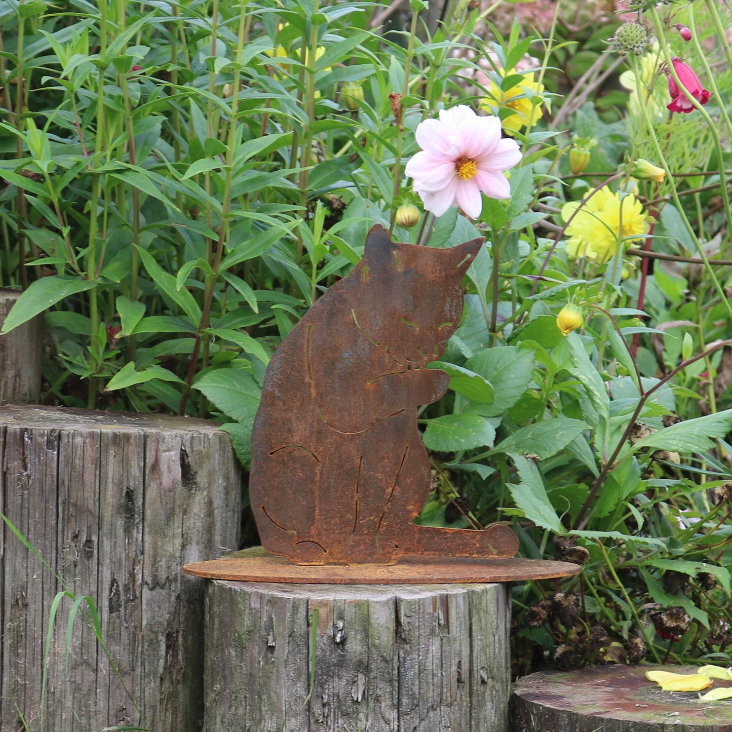 Cat Licking Its Paw Statue
